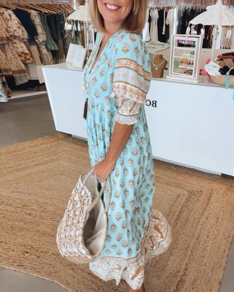 MANA | CHIQUE MIDI-JURK MET BLOEMENPRINT EN V-HALS
