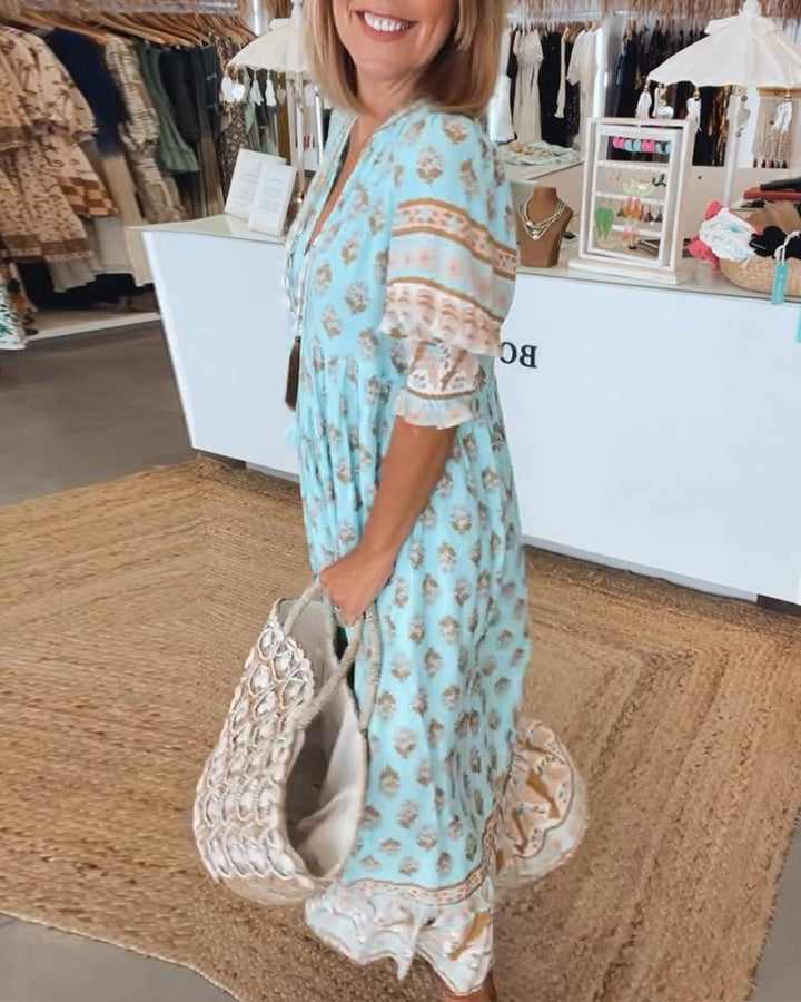 MANA | CHIQUE MIDI-JURK MET BLOEMENPRINT EN V-HALS