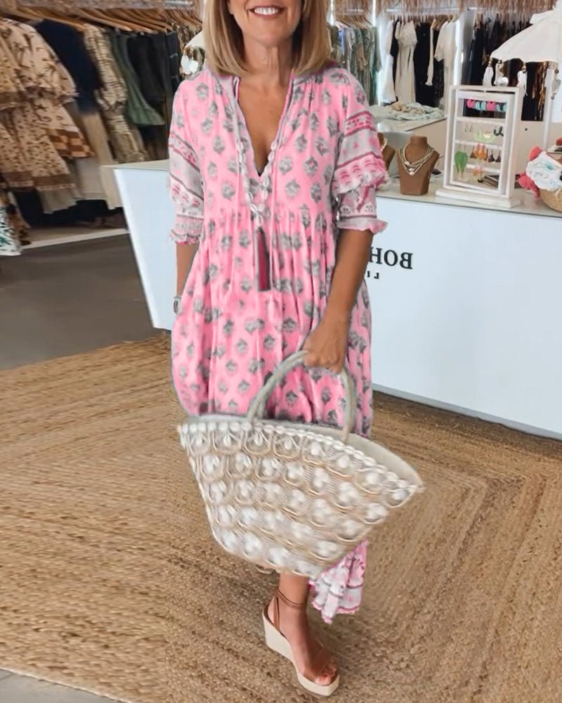 MANA | CHIQUE MIDI-JURK MET BLOEMENPRINT EN V-HALS
