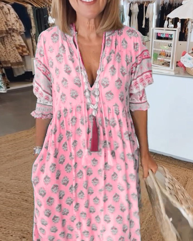 MANA | CHIQUE MIDI-JURK MET BLOEMENPRINT EN V-HALS