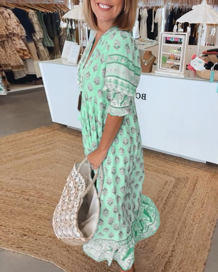 MANA | CHIQUE MIDI-JURK MET BLOEMENPRINT EN V-HALS