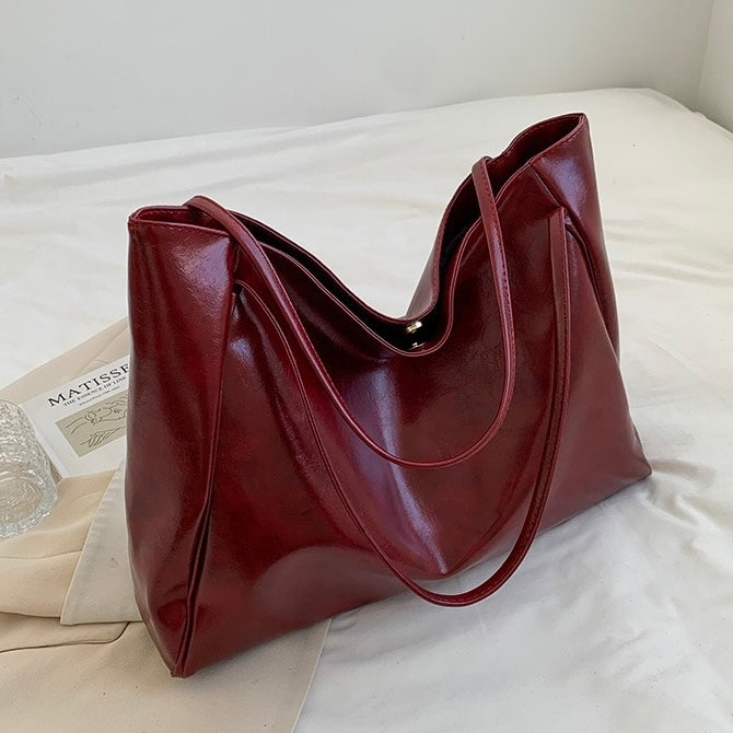 Patricia™ | Glinsterende leren tas