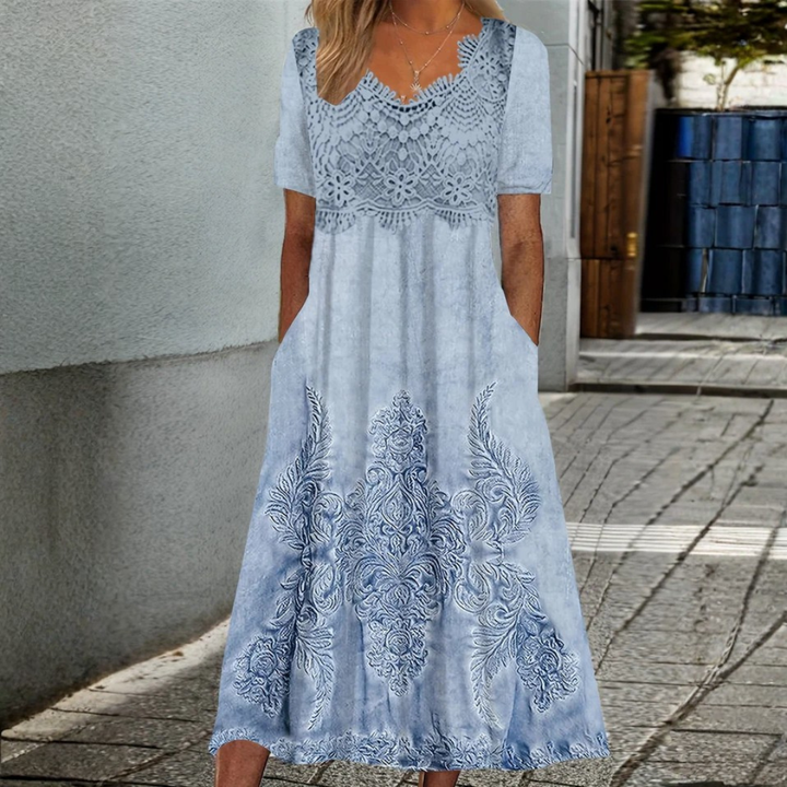 INDIGO | ELEGANTE MIDI-JURK MET BLOEMENPRINT