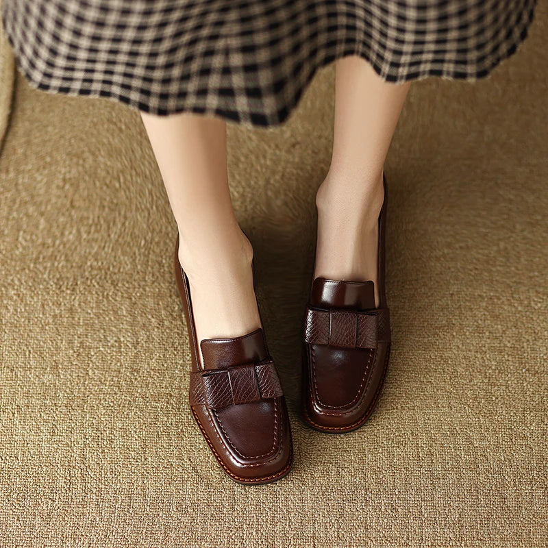 Contessa loafers met knoopdetail